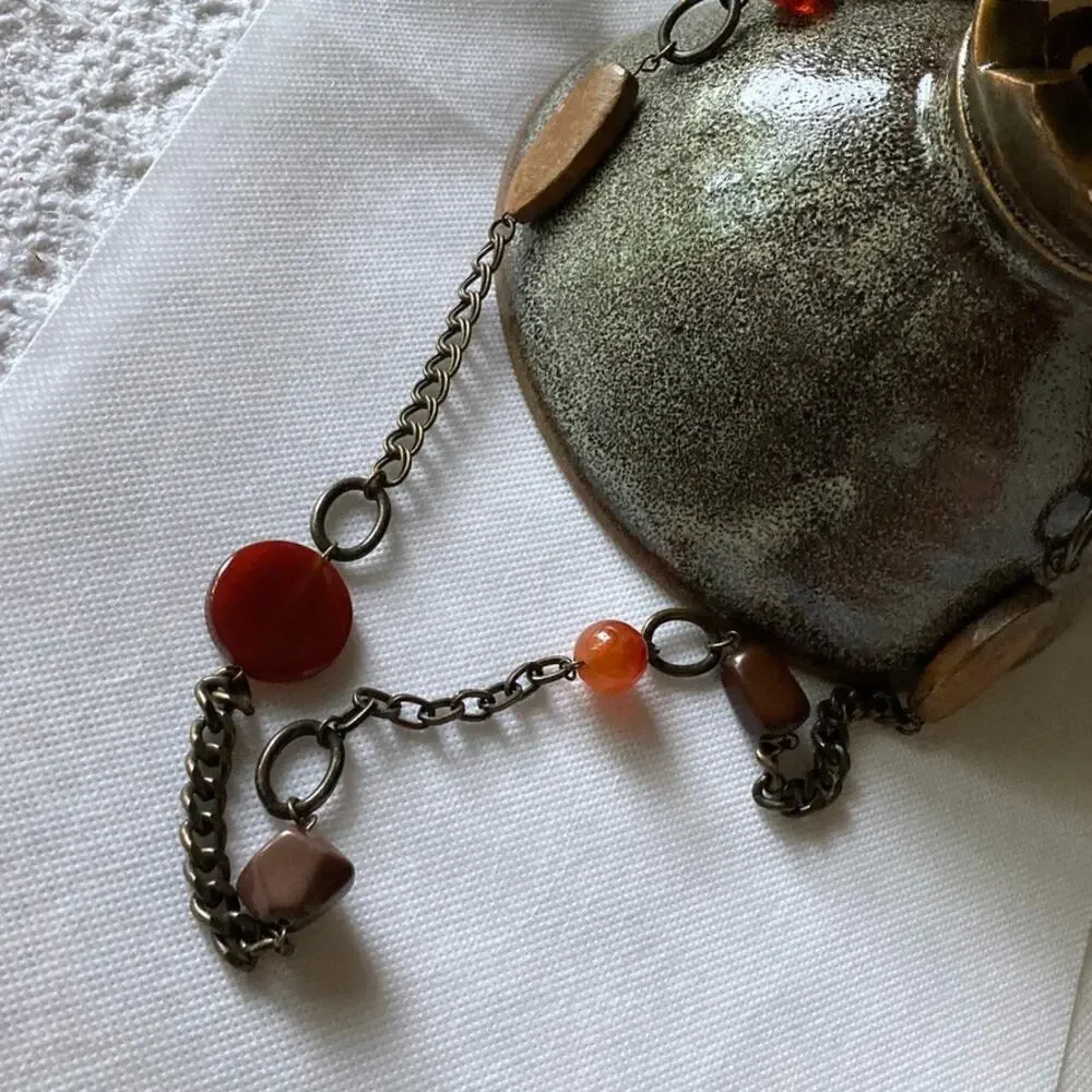 Brass- and earth-tone chunky statement necklace
